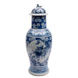 A Chinese blue and white baluster vase and cover: with kylin finial,