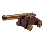 A bronze desk cannon:,