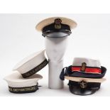 Two Royal Navy Class II Sailors' hats:, one with tally for HMS Devonshire,