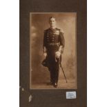 A signed full length photograph portrait of Expedition member Edward Evans in Royal Navy Uniform by