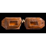 A pair of handmade stitched brown two piece leather snow goggles used by F E C Davies aboard the
