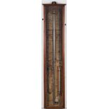 A late 19th/early 20th century oak 'Admiral Fitzroy' pattern barometer: of typical form with