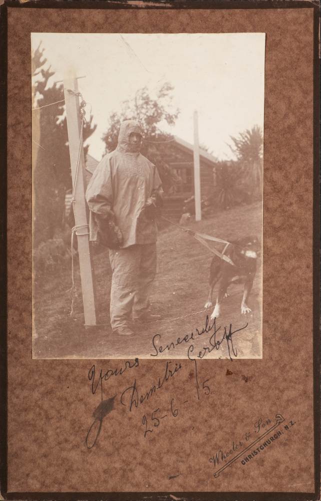 A signed full length photograph of the expedition dog handler Demetri Geroff:,
