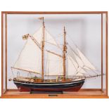 A cased scale model of the Swedish Top Sail Schooner 'Lilla Dan': fully rigged over detailed deck