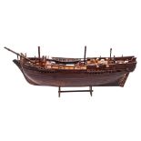 A cut away model of an 18th century Royal Navy Armed Vessel style ship: with simulated planked