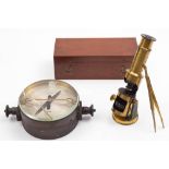 A small lacquered brass student microscope in mahogany case: together with a brass cased resistance