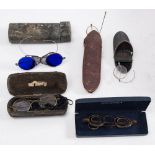 A pair of 19th century steel spectacles: with blue glass lenses and folding mesh side screens,