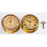 A Smiths Empire brass bulkhead clock: with Roman numerals and subsidiary seconds dial, 18.