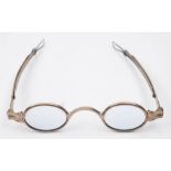 A pair of 19th century American coin silver spectacles by J L Moore, New York,