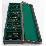 A box of eighteen various early 20th century spectacle frames: including a pair of tortoiseshell