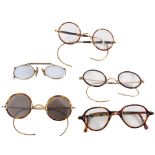 Three pairs of gold plated and tortoiseshell rimmed spectacles: including a pair with a 12ct gold