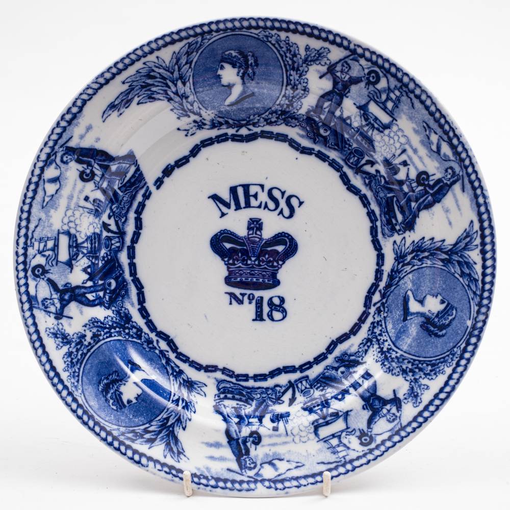 A Victorian blue and white mess plate 'young-head' pattern 'Mess No 18': by The Bovey Pottery