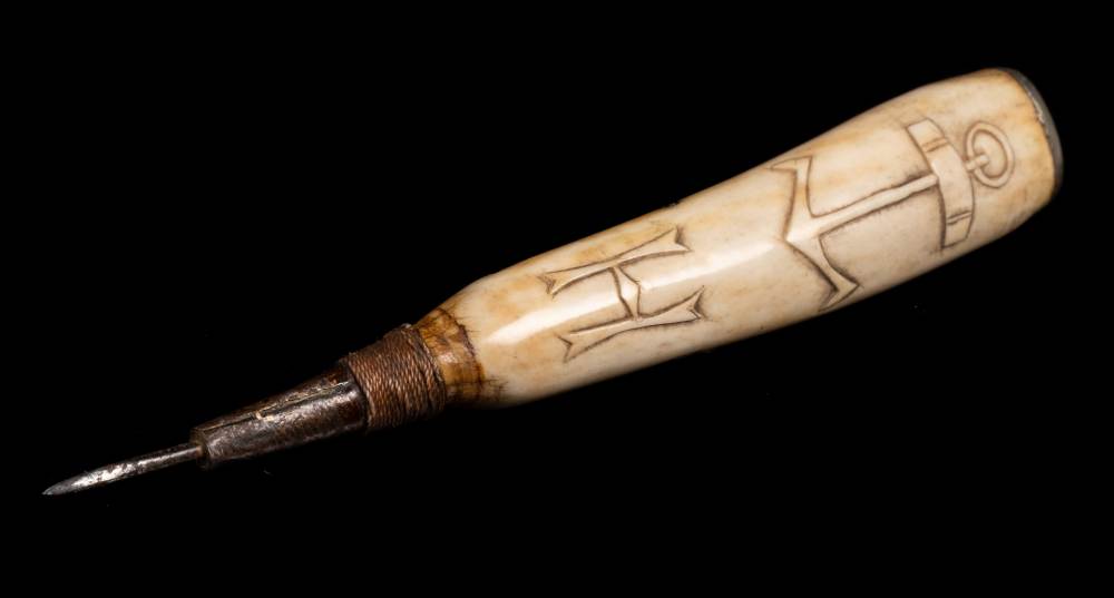 A 19th century marine ivory sailor's dib:,