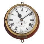 A late 19th century brass bulkhead timepiece by Whyte, Thomson & Co,