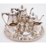 A Furness Bermuda Lines nine piece silver plated tea set and cruet by Mappin & Webb, London:,