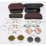 Four pairs of steel framed spectacles:,