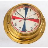 An Observer Electro brass cased quartz radio room bulkhead clock: 22cm diameter.
