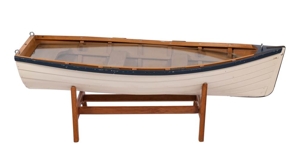 A scale model of a rowing boat 'Hanah': the white painted plank and pinned hull, fitted seats,