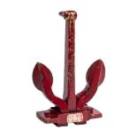 A cold painted bronze miniature presentation Navy stocklass style anchor: overpainted in red and