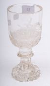 A 19th century cut glass goblet with hunting scene decoration: on a faceted knopped stem, 18.