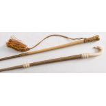 Two 19th century lady's riding crops: one with carved ivory dog's head finial with ivory ferrule,