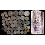 A collection of various Swiss coins and a note: