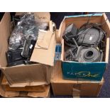 A collection of various 35mm cameras and photographic equipment in 4 boxes.