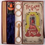 An Edwardian wooden 'The Game of Aunt Sally' set in original box by Spears of Bavaria: with wooden