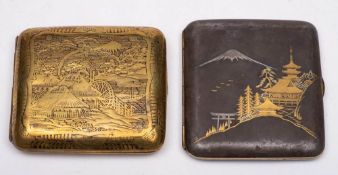 A Komai style iron cigarette case: inlaid with gold and silver depicting a temple before mount Fuji,