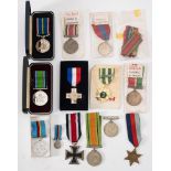 A group of WWII and later medals: including a George VI Imperial Service Medal to Ernest Edward