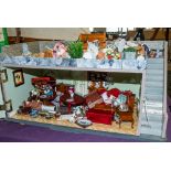 A 20th Century doll's shop 'Serendipity' with fitted interior, figures, fixtures and fittings.