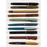 A group of ten vintage fountain pens: including a Swan 'SF2' self -filler by Mabie, Todd & Co Ltd .