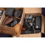 A collection of various cameras including: Olympus 35RC and others,