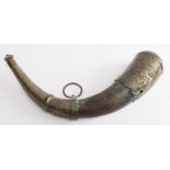 A Persian brass mounted horn powder flask: with floral decoration to mounts, iron suspension ring,