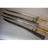 A French 1866 pattern Chassepot bayonet: with 57cm fullered yataghan blade, and ribbed brass grip,