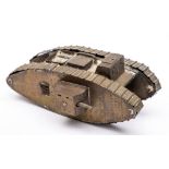 A WWI Trench art model of a tank: with box turret and exhausts to top, (missing one side gun) 23.