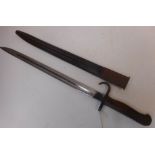 A 1907 MK1 bayonet: with 43cm fullered blade, hooked quillion and wood slab grips,