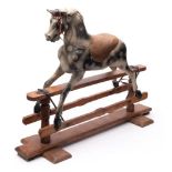 An early 20th century rocking horse by G and J Lines Brothers,