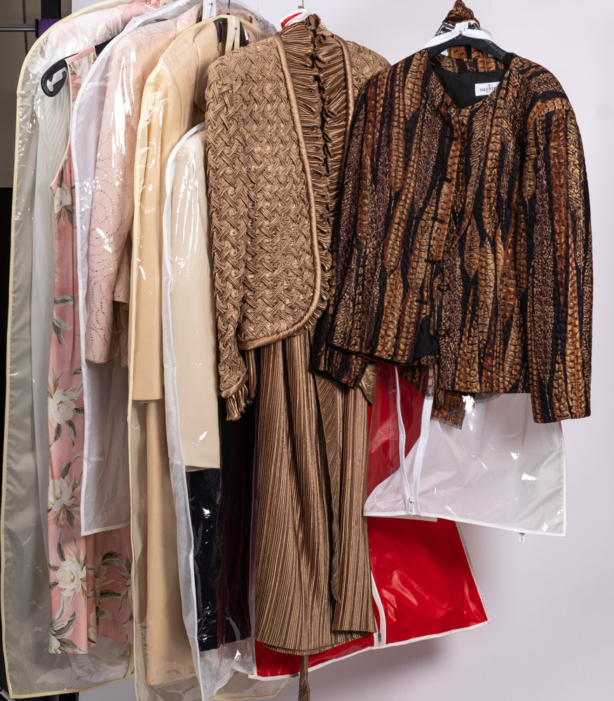 A collection of lady's dresses and evening wear: including a Valentino jacket and scarf,