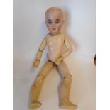 An Armand Marseille bisque head doll: impressed 1894. A.M. 6 DEP.