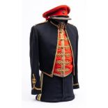 An Elizabeth II 14th/20th Kings' Hussars Officers Mess Dress: red cloth peaked cap with gold braid