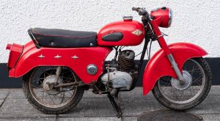A 1960 Ambassador 3 star 197cc motorcycle: registration '203 UXF', red with chrome trim,