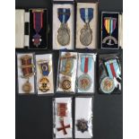 A group of Masonic jewels,: including a silver and enamel RMIG breast badge,