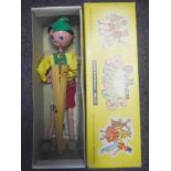 A Pelham puppets: - Tyrolean Boy puppet, incorrectly boxed in a SS Cowboy box.