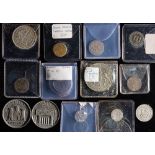 A small group of miscellaneous coins and tokens: including North Cornwall railway medallion opened