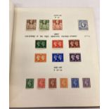 A vintage Stanley Gibbons "Exeter" stamp album. Containing George V & VI mostly unused stamps.