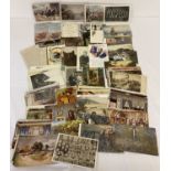 A quantity of 100+ assorted Victorian and vintage postcards to include RP's.