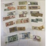 30 vintage foreign bank notes.