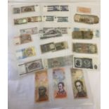 30 vintage foreign bank notes.