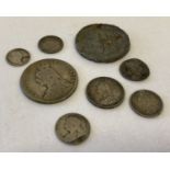 8 silver and white metal Victorian coins in varying conditions.